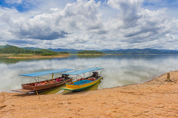 Fototapeta na wymiar Boat at the Kaeng Krachan Dam in Kaeng Krachan National Park Thailand