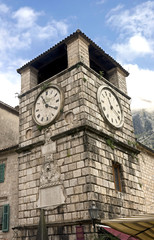 Fototapeta na wymiar Old clock tower. Old city of Kotor, Montenegro.