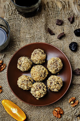Obraz na płótnie Canvas chocolate lentil prunes walnuts orange vegan balls