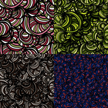 Set of four seamless doodle patterns
