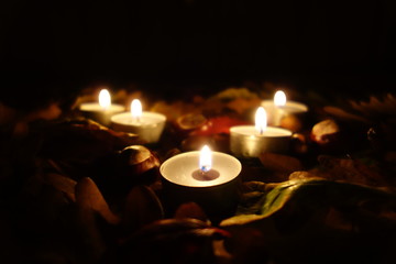 Memorial candles at cemetery