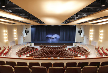 Grand piano on auditorium stage