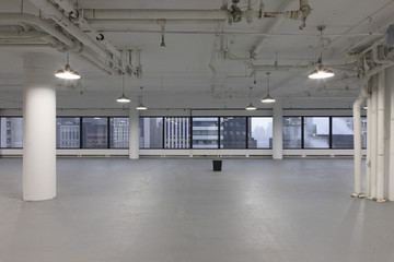 Bucket in empty office space