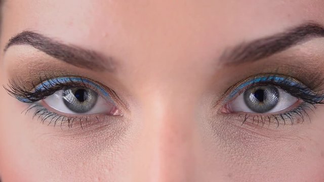 Woman blinking eyes