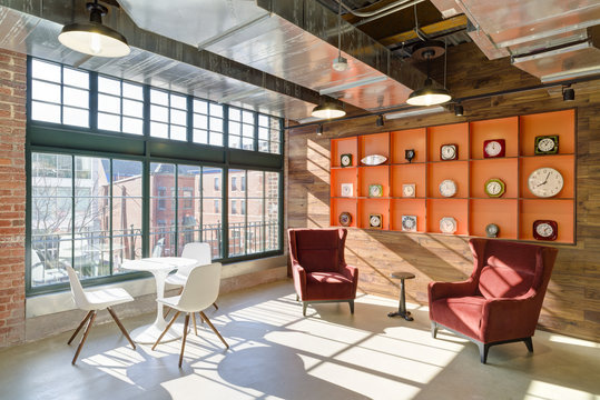 Display of clocks on shelves in modern apartment