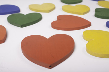 colorful wooden toys hearts