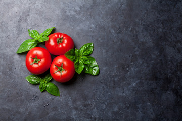 Fresh ripe garden tomatoes and basil