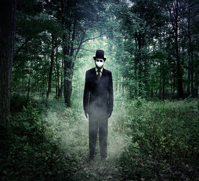 Evil Tall Man Standing in Scary Woods Alone