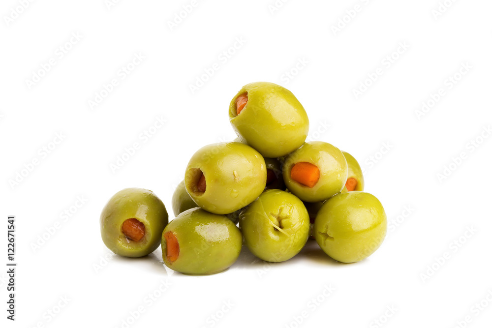 Wall mural Green olives stuffed with red paprika isolated on white.