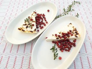 Baked cheese with a cowberry in Finnish