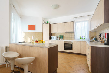 Interior of a kitchen with bar counter in a villa