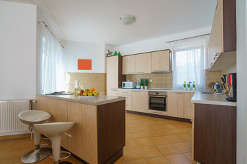Interior of a kitchen with bar counter in a villa