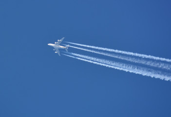 Airbus 380 on the blue sky - obrazy, fototapety, plakaty