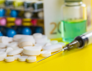 Selection of different pills in form of tablets and capsules