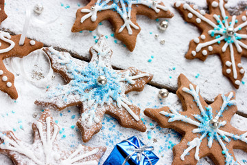 Chocolate cookies in the form of snowflakes for New Year holiday