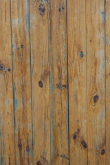 Abstract background: yellow lacquered wood in the form of a flat board.