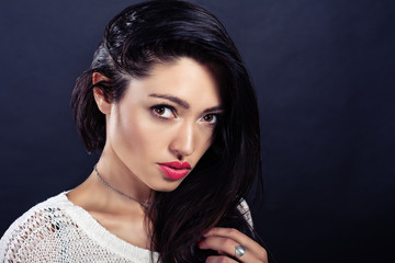 Beautiful girl in a white pullover