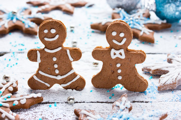 Gingerbread man close up on a festive white background