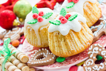Obraz na płótnie Canvas Traditional cuisine. Christmas treats, cupcakes, cookies