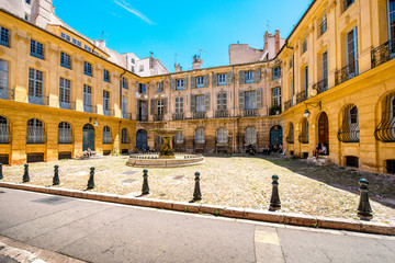 Fototapeta na wymiar Albertas square with beautiful old fountain in Aix-en-Provence old town in France. French architecture in Provence
