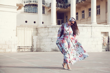 Plus size model in floral dress