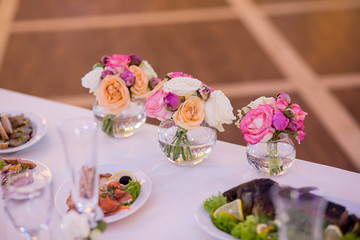 Wedding decoration on table. Floral arrangements and decoration.
