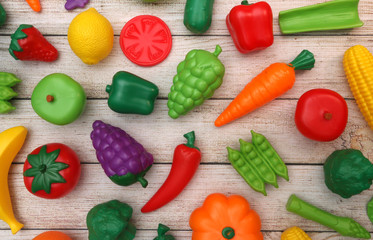 Fake Fruits and Vegetables on a Wooden Table