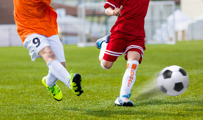 Soccer kick. Player kicking soccer ball