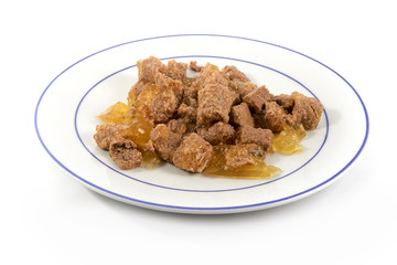 meal for cats or dogs, industrial canned wet food on a plate   isolated on white