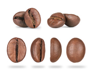 set of coffee beans close-up in different positions isolated on