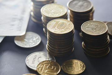 Russian iron coins lay on the dark surface closeup