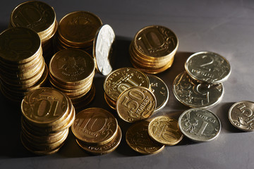 Russian iron coins lay on the dark surface closeup