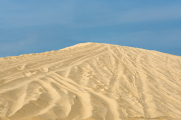 White sand dunes with blue skies, Mui Ne, Vietnam