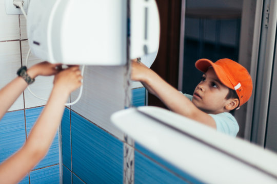 Child Using Hand Dryer