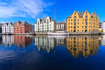 Fototapeta na wymiar Colorful houses in the center of the Alesund city in the summer, Norway