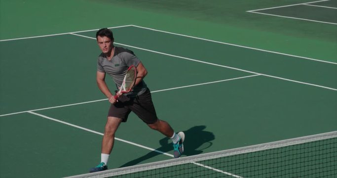 Tennis player returns.