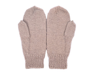 Chunky knit wool mittens separated on white background