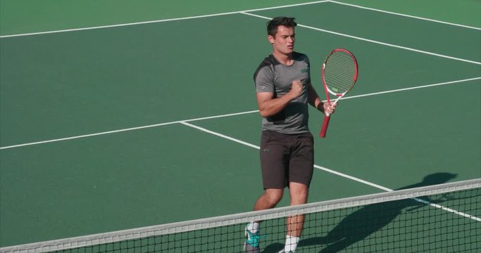 Tennis player returns.
