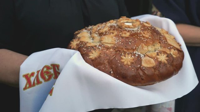 Woman holds a lush delicious loaf