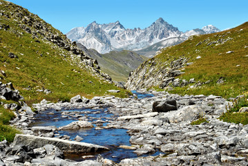 Fototapeta na wymiar River in the mountain valley of L'Ubayette, in the park of Mercantour between France and Italy