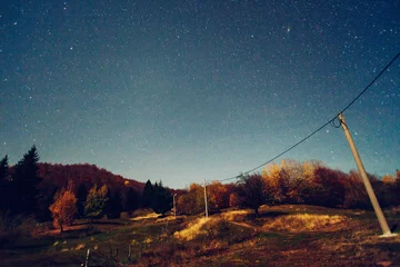 Foto auf Acrylglas Night sky with power line © Travel_Master