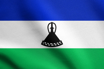 Flag of Lesotho waving with fabric texture