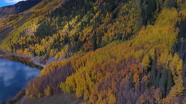 Aerial Drone footage of Crystal Lake in the Colorado Rockies with fall colors