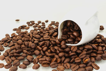 Roasted Coffee Beans / Roasted Coffee Beans In Cup Scattered Isolated On White.