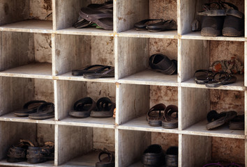 Shoes near entering the temple