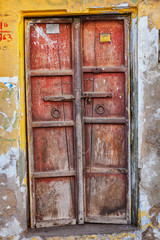 Ancient red wooden door