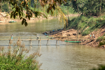 Bamboo bridge across the river