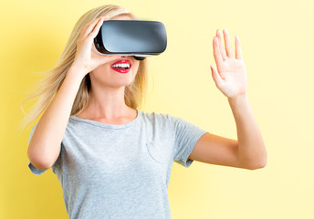 Young woman using a virtual reality headset