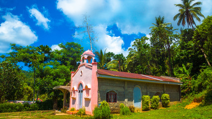 Pink Spanish Catholic Church in the jungle provinces of hte Philippines - Catanduanes, Bicol