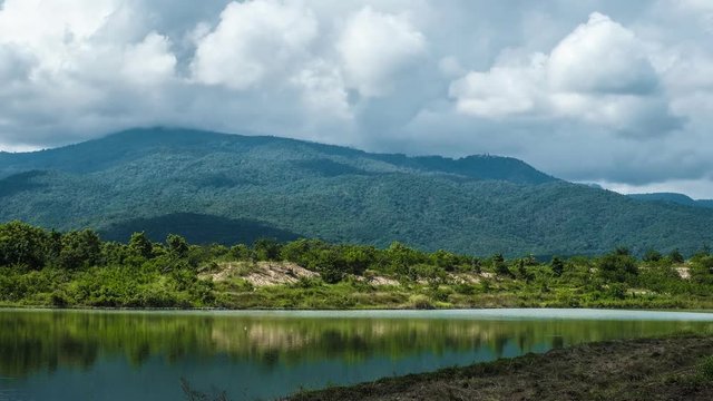 Beautiful cloud moving behind mountain and lake - Timelapse 4k